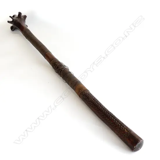 A 19thC Fijian hardwood rootstock war club,